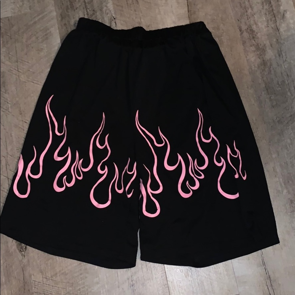 Black shorts with pink flames